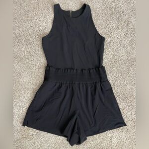 Athleta Cosmic Flutter Romper in Black Size Medium EUC